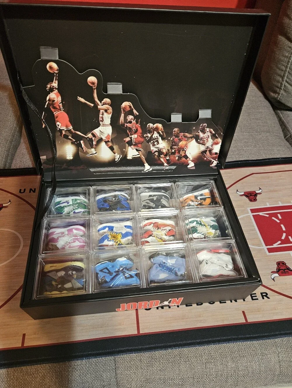 Jordan Gift Bag & Box Set with 12 pairs of mini sneakers keychain included.